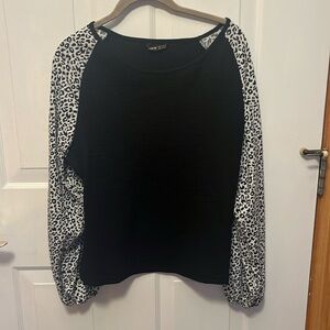 SHEIN waffle knot top with leopard print sleeves.